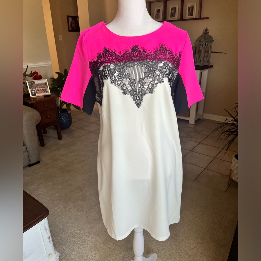 Dress. Pink and white with black lace